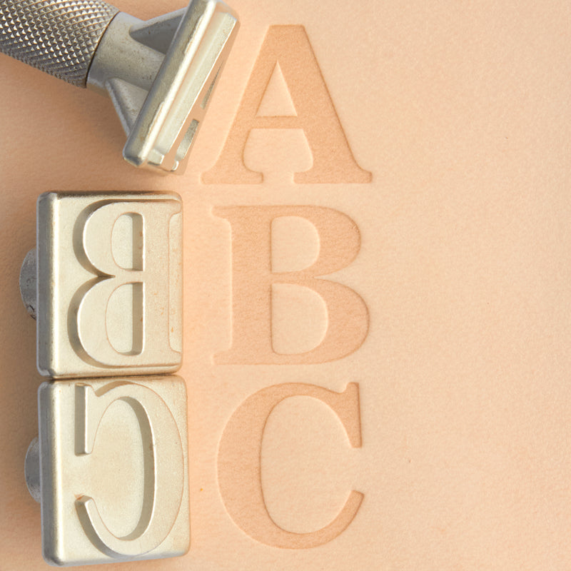 Juego de sellos de alfabeto Serif Craftool®